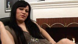 Dark-haired shemale enjoys in jerking off here