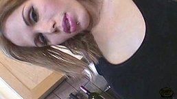 Naughty bomb enjoys in posing in a kitchen for us